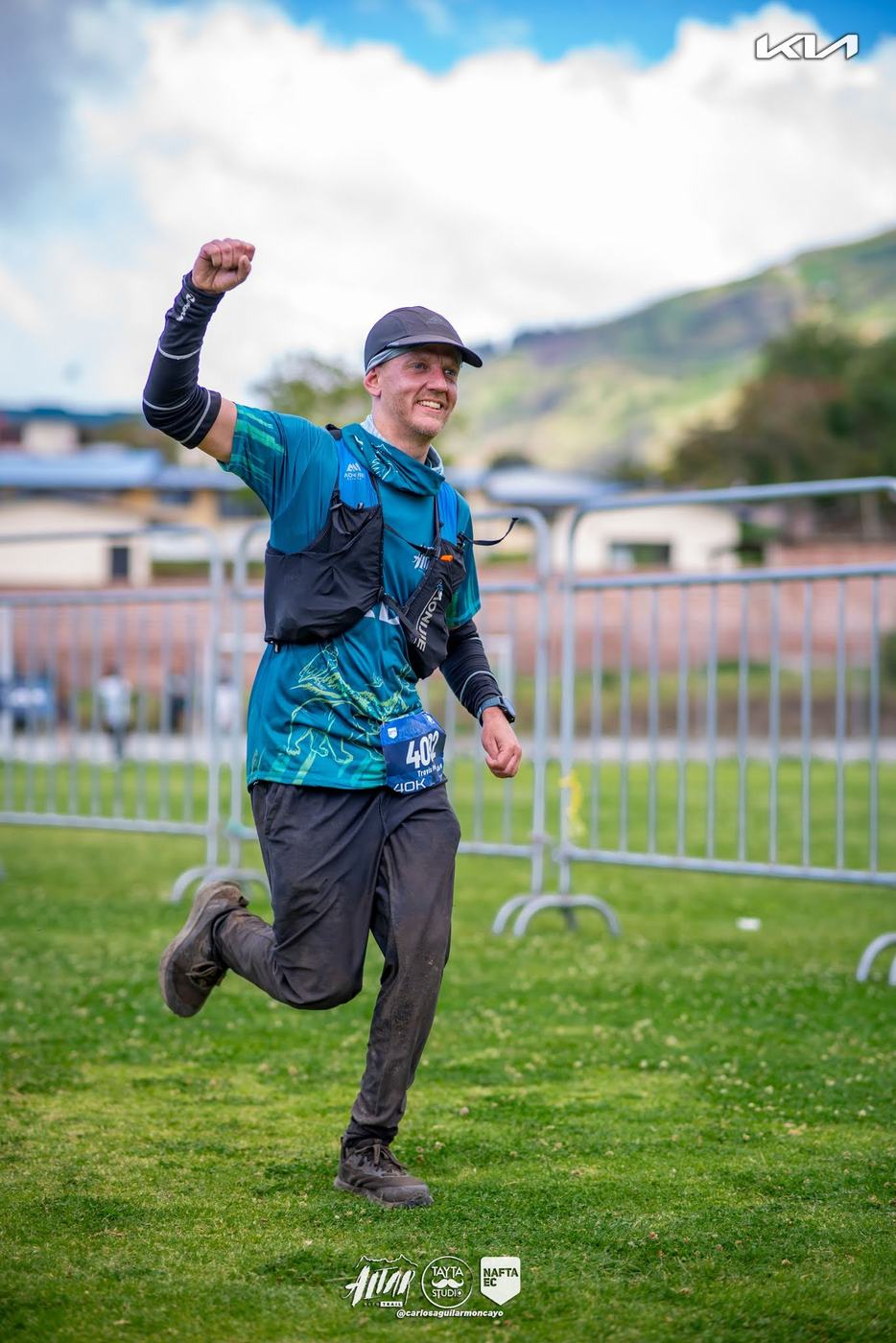 Travis Pence celebrating during a trail race