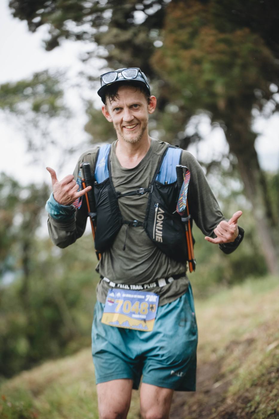 Travis Pence smiling during an Ecuador trail race